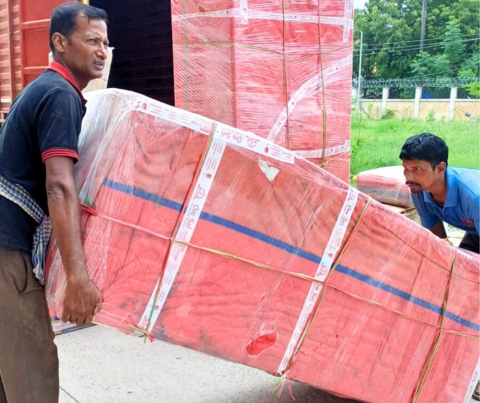 Om Sai packers movers in patna loading staff in truck for relocation