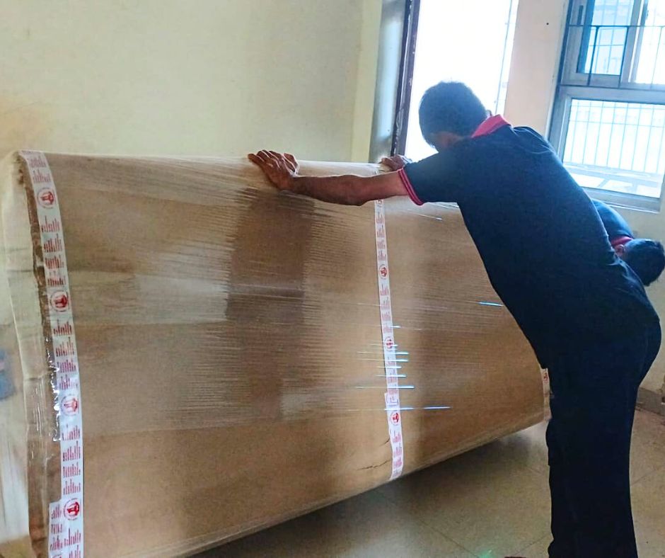 staff of Packers and Movers in Katihar packing household goods for relocation